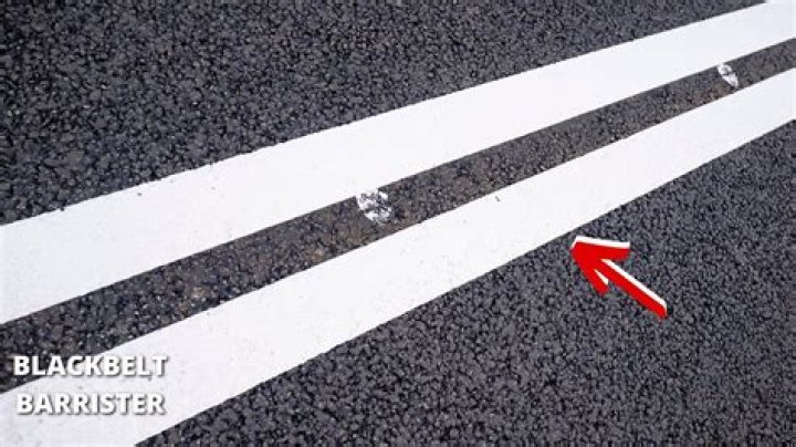 Can you cross a single white line?