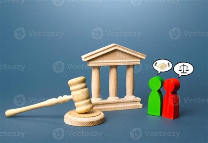 What is meant by justiciable disputes?