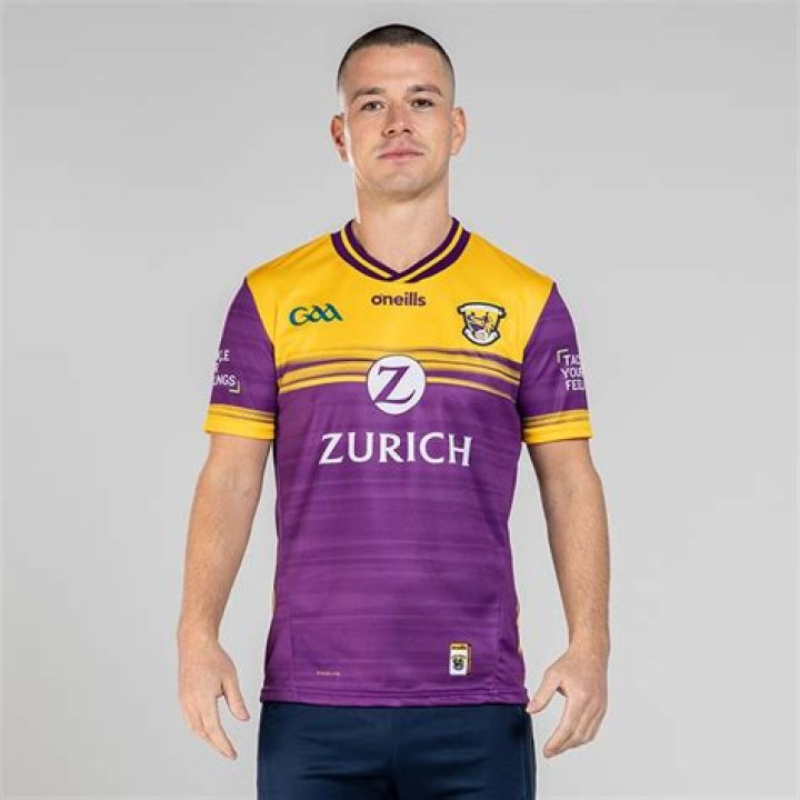 Why do wexford wear purple and gold?